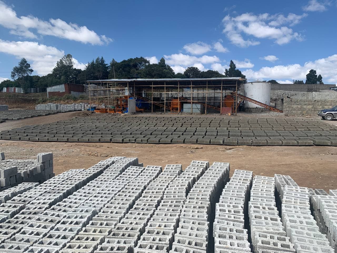 Hollow concrete blocks curing in the yard